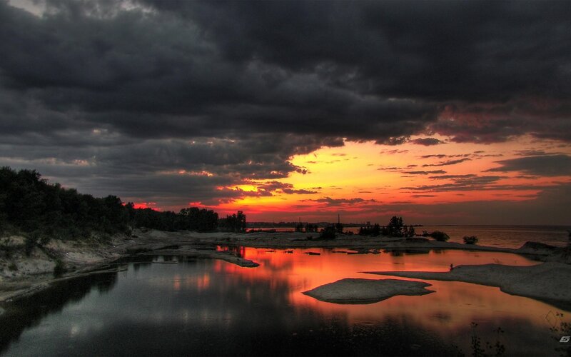 Sunset over River Delta — Orange, Dramatic, Photograph