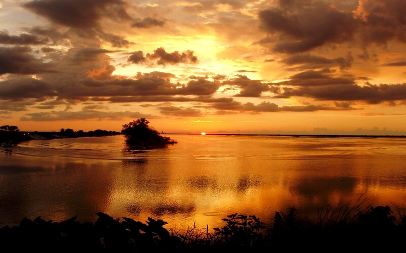Sunset over River — Orange, Dramatic, Photograph, Clouds, Tree, Yellow