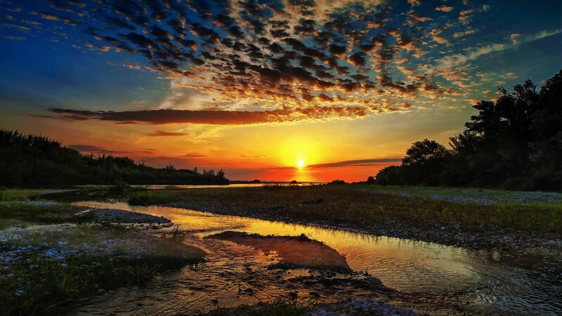 Sunset over River — Orange, Dramatic, Photograph, Clouds, Trees, Blue, Yellow