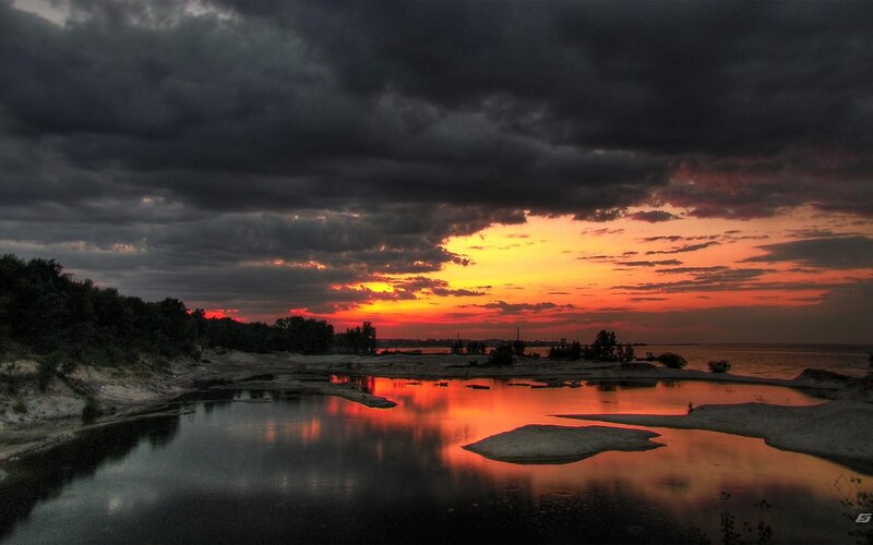 Sunset over River — Orange, Dramatic, Photograph, Clouds, Trees, Sand