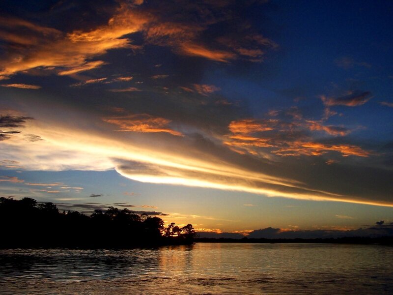 Sunset over River — Orange, Dramatic, Photograph, Clouds, Trees, Water