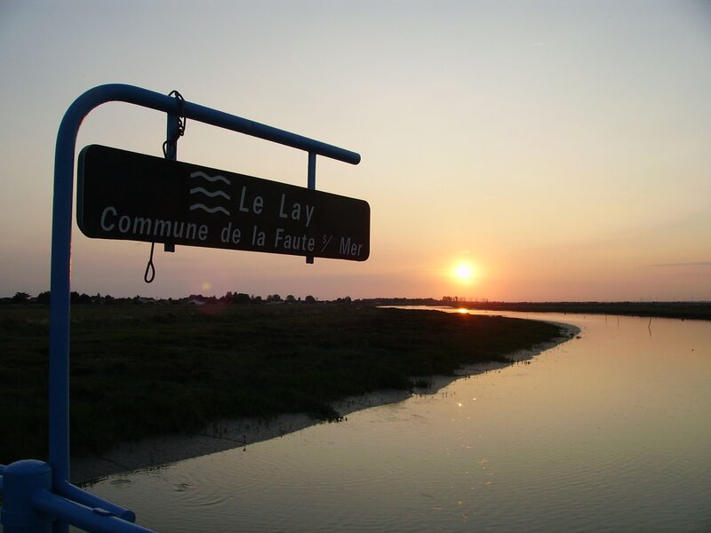 Sunset over River — Orange, Serene, Photograph, Sign