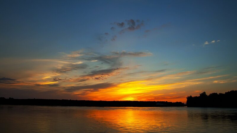 Sunset over River — Orange, Serene, Photograph, Sky, Clouds, Trees, Blue, Black