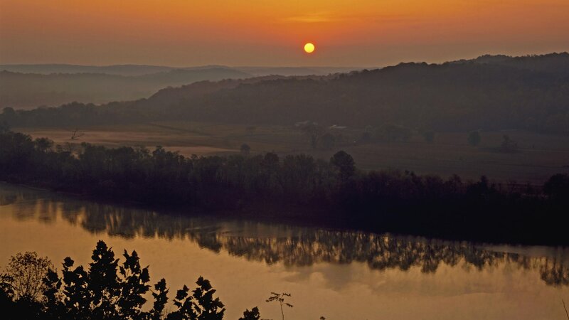 sunset over river valley