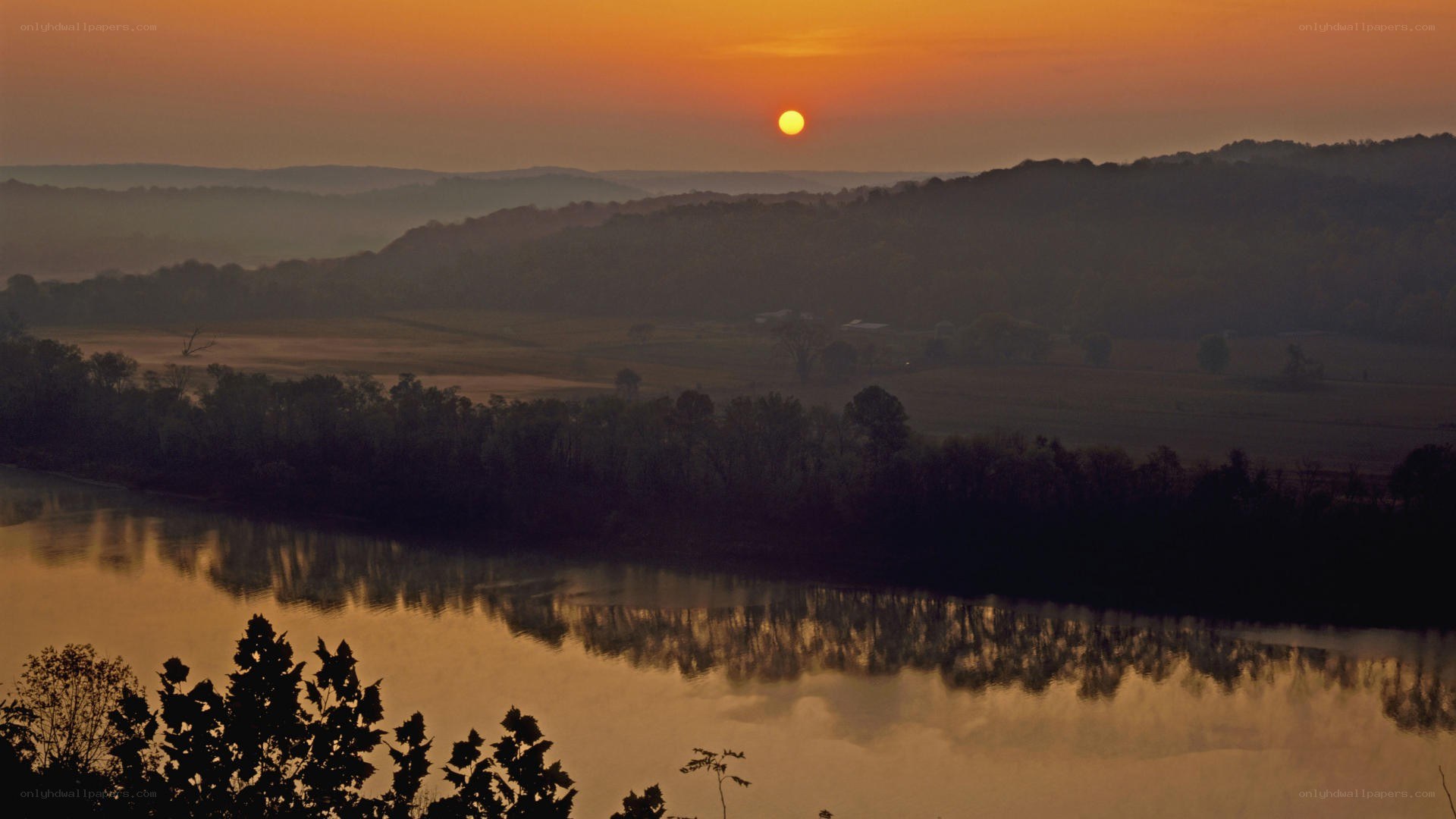 sunset over river valley