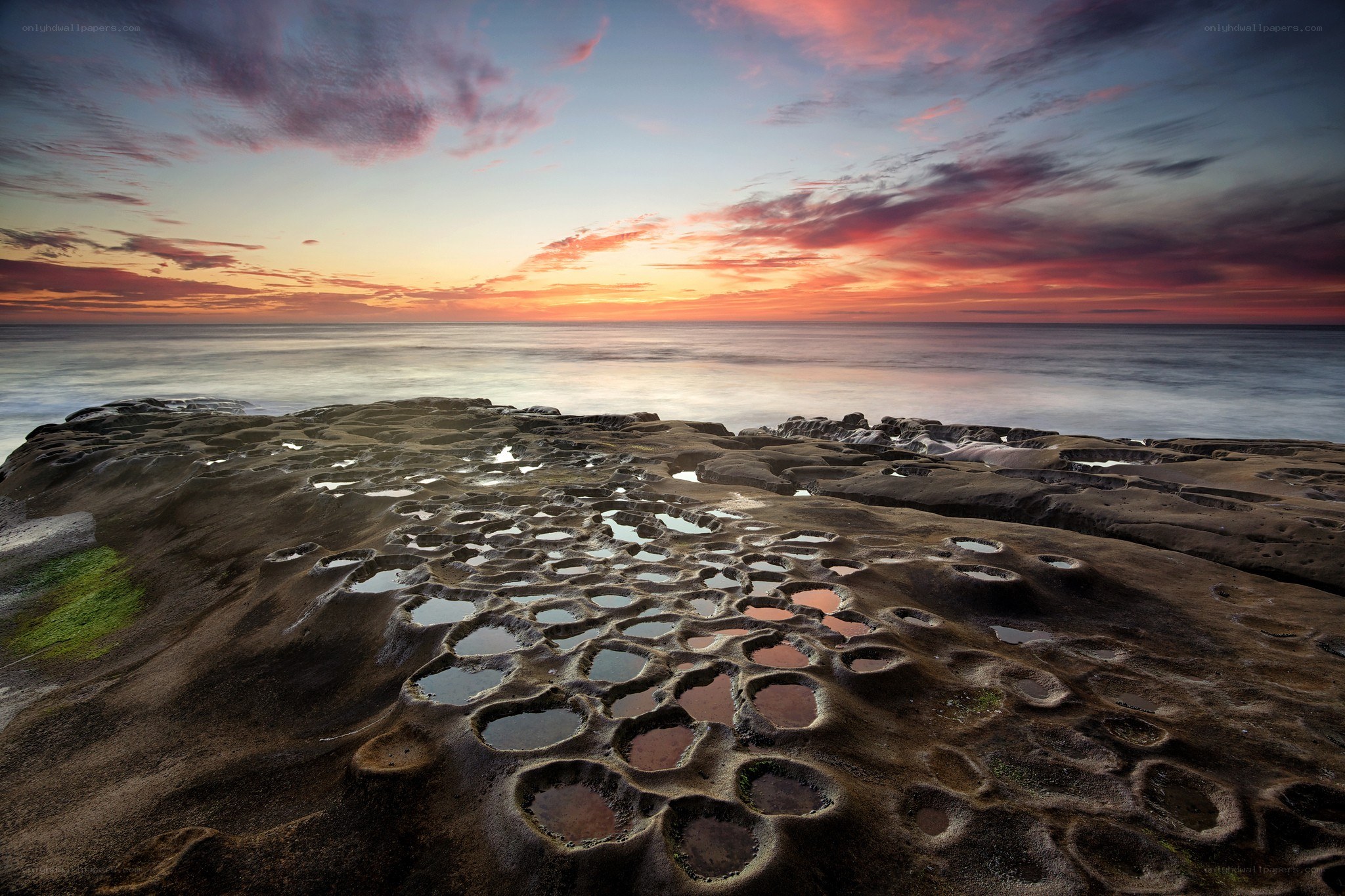 Sunset over rock pools