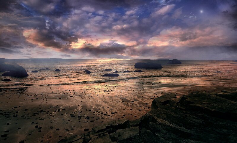 Sunset over rocky beach