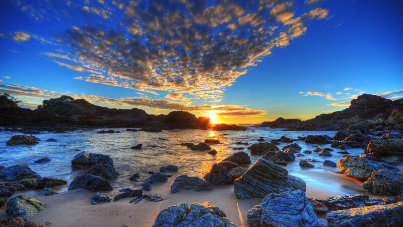 Sunset over Rocky Beach — Blue, Dramatic, Photograph, Rocks, Ocean, Sky, Sun