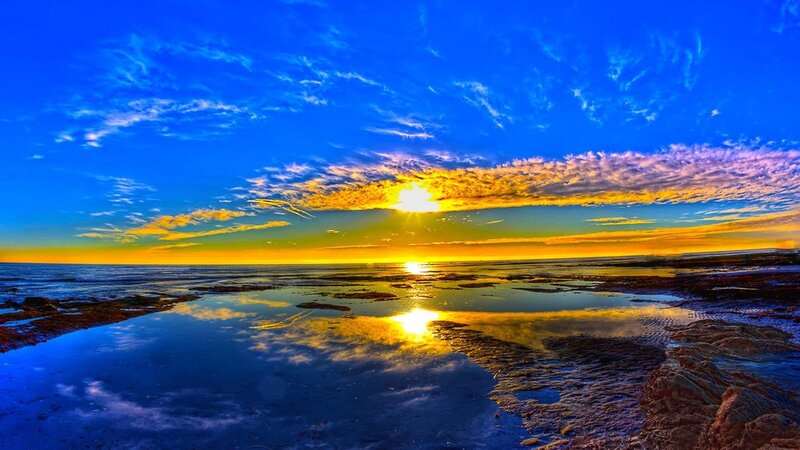 Sunset over Rocky Beach — Blue, Dramatic, Photograph, Sun