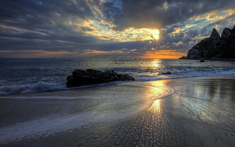 Sunset over Rocky Beach — Blue, Dramatic