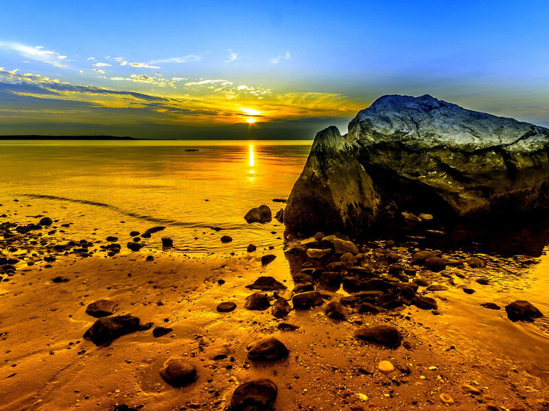 Sunset over Rocky Beach — Blue, Serene, Photograph, Rocks