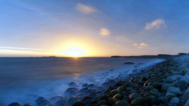 Sunset over Rocky Beach — Blue, Serene, Photograph, Sun