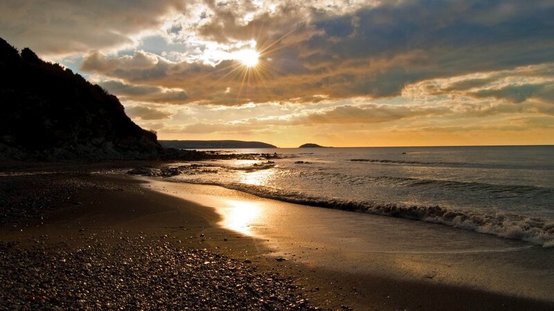 Sunset over Rocky Beach — Gold, Dramatic, Photograph