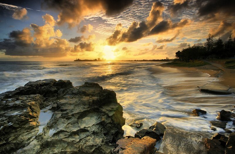 Sunset over Rocky Beach — Gold, Dramatic