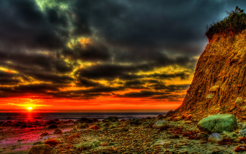 Sunset over Rocky Beach — Orange, Dramatic, Photograph, Clouds