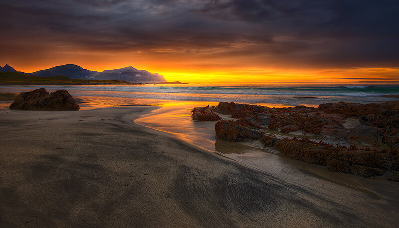 Sunset over Rocky Beach — Orange, Dramatic, Photograph, Mountains