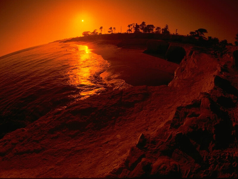 Sunset over Rocky Beach — Orange, Dramatic, Photograph, Ocean, Cliff, Trees