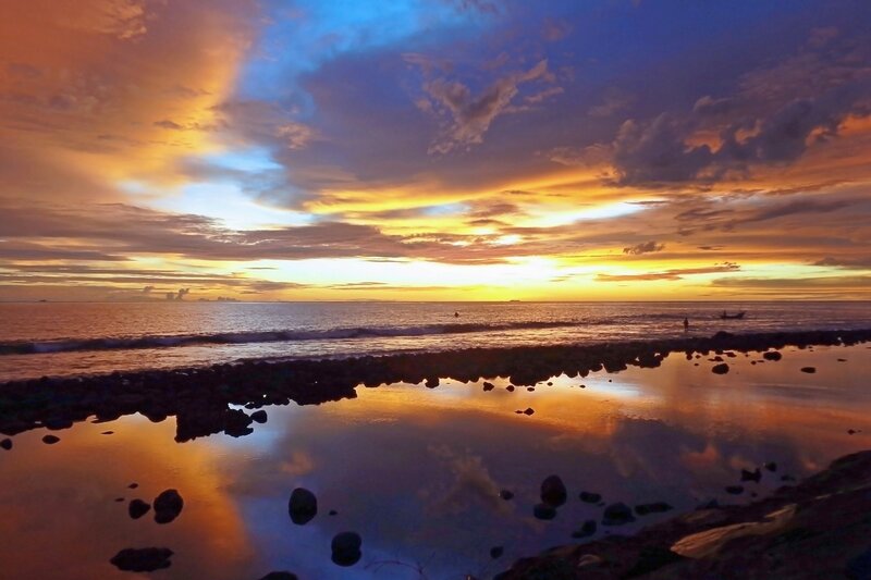 Sunset over Rocky Beach — Orange, Dramatic, Photograph, Ocean, Clouds, Rocks