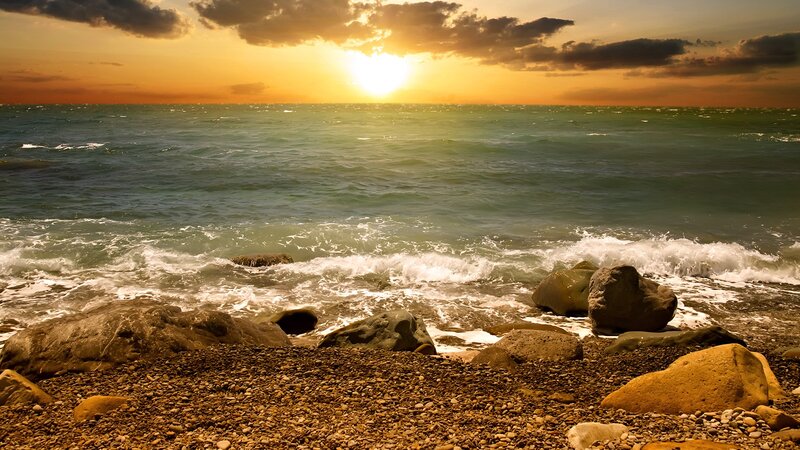 Sunset over Rocky Beach — Orange, Dramatic, Photograph, Ocean, Rocks, Clouds, Blue, Brown