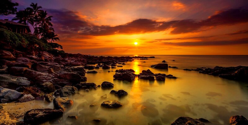 Sunset over Rocky Beach — Orange, Dramatic, Photograph, Palm Trees, Rocks