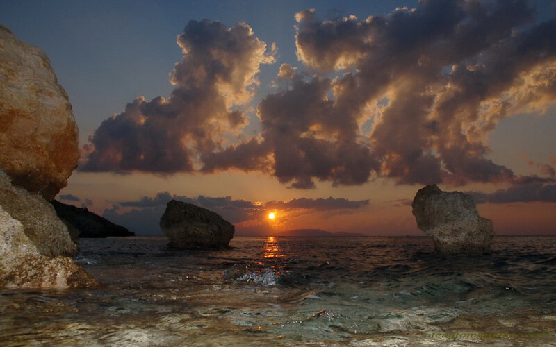Sunset over Rocky Beach — Orange, Dramatic, Photograph, Rocks, Sea