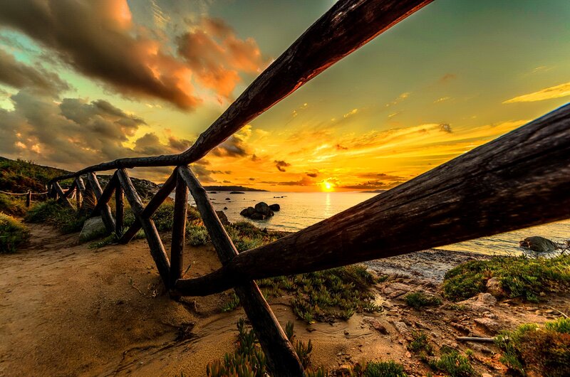 Sunset over Rocky Beach — Orange, Dramatic, Photograph, Wooden Fence