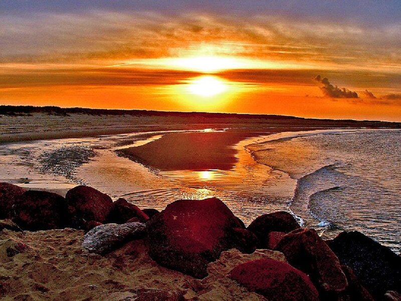 Sunset over Rocky Beach — Orange, Serene, Photograph, Rocks, Sand, Ocean