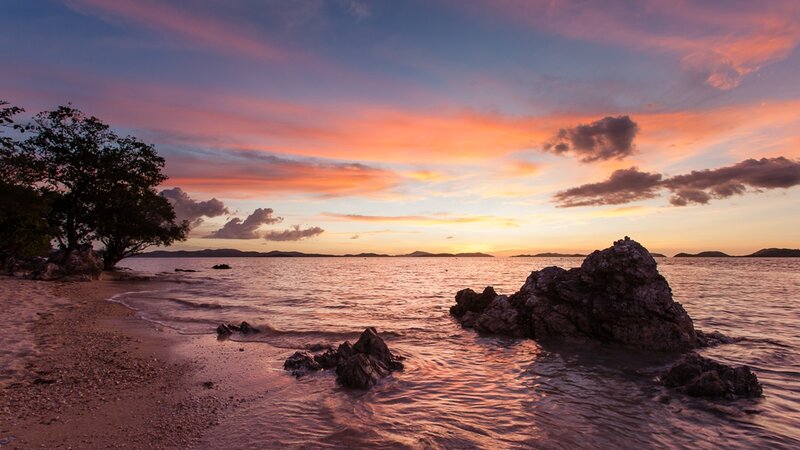 Sunset over Rocky Beach — Orange, Serene, Photograph, Rocks, Trees