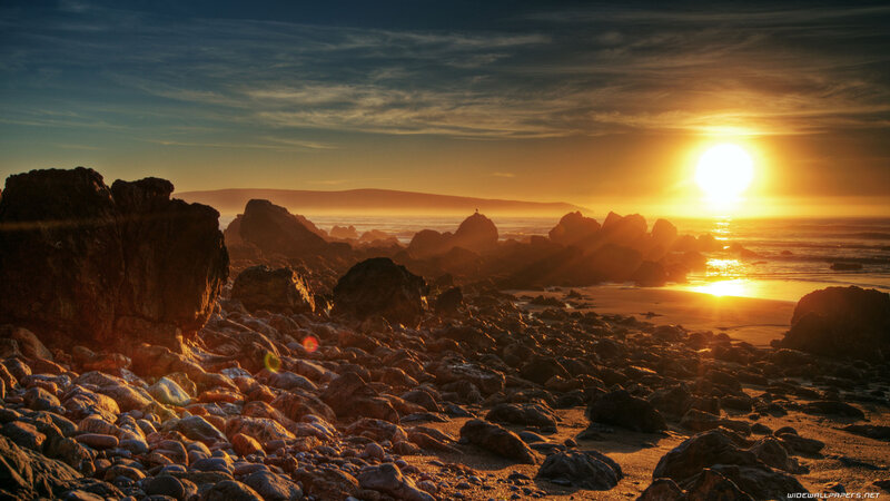 Sunset over Rocky Beach — Orange, Serene, Photograph, Sun, Rocks