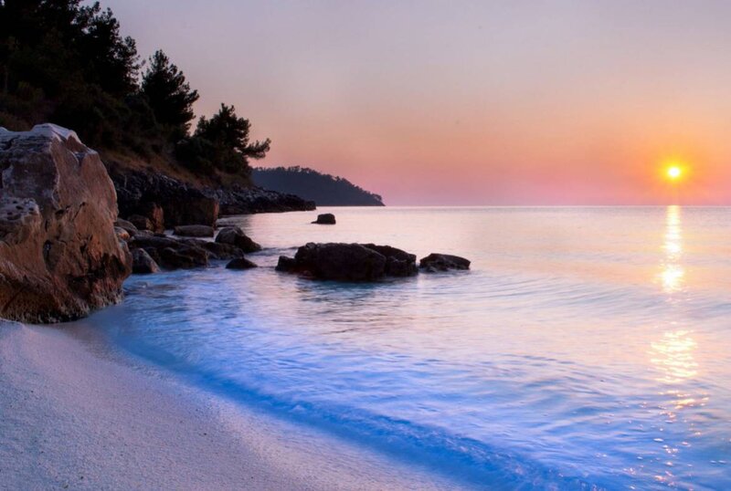 Sunset over Rocky Beach — Orange, Serene, Photograph, Sun, Sea, Rocks