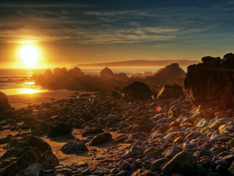 Sunset over Rocky Beach — Orange, Serene, Photograph, Sun