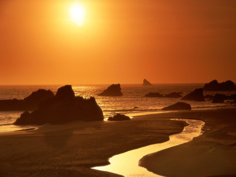 Sunset over Rocky Beach — Orange, Serene