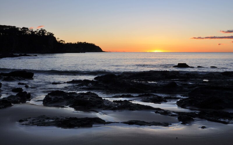 Sunset over Rocky Beach — Orange