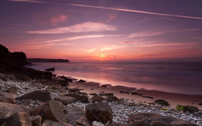 Sunset over Rocky Beach — Purple, Serene, Photograph, Ocean, Sky, Rocks