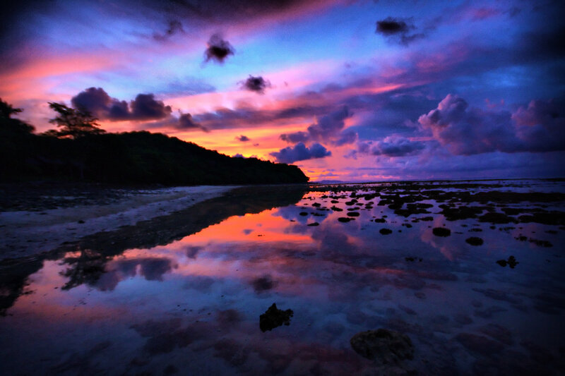 Sunset over Rocky Beach — Purple