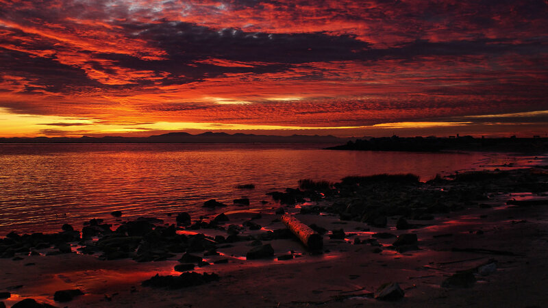 Sunset over Rocky Beach — Red