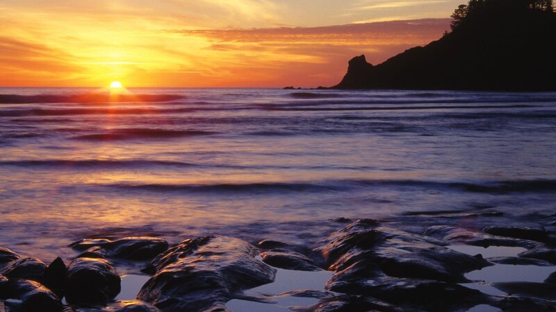 Sunset over Rocky Beach — Serene