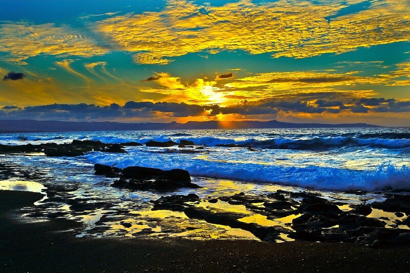 Sunset over Rocky Beach — Yellow, Dramatic