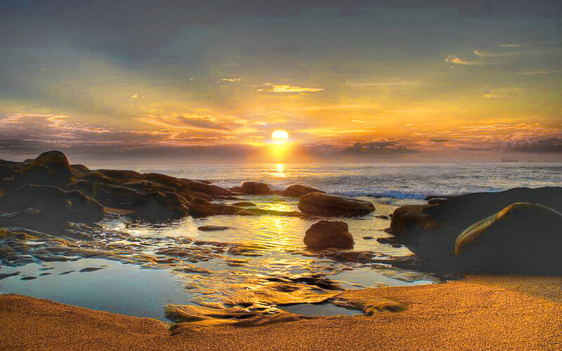 Sunset over Rocky Beach — Yellow, Serene, Photograph