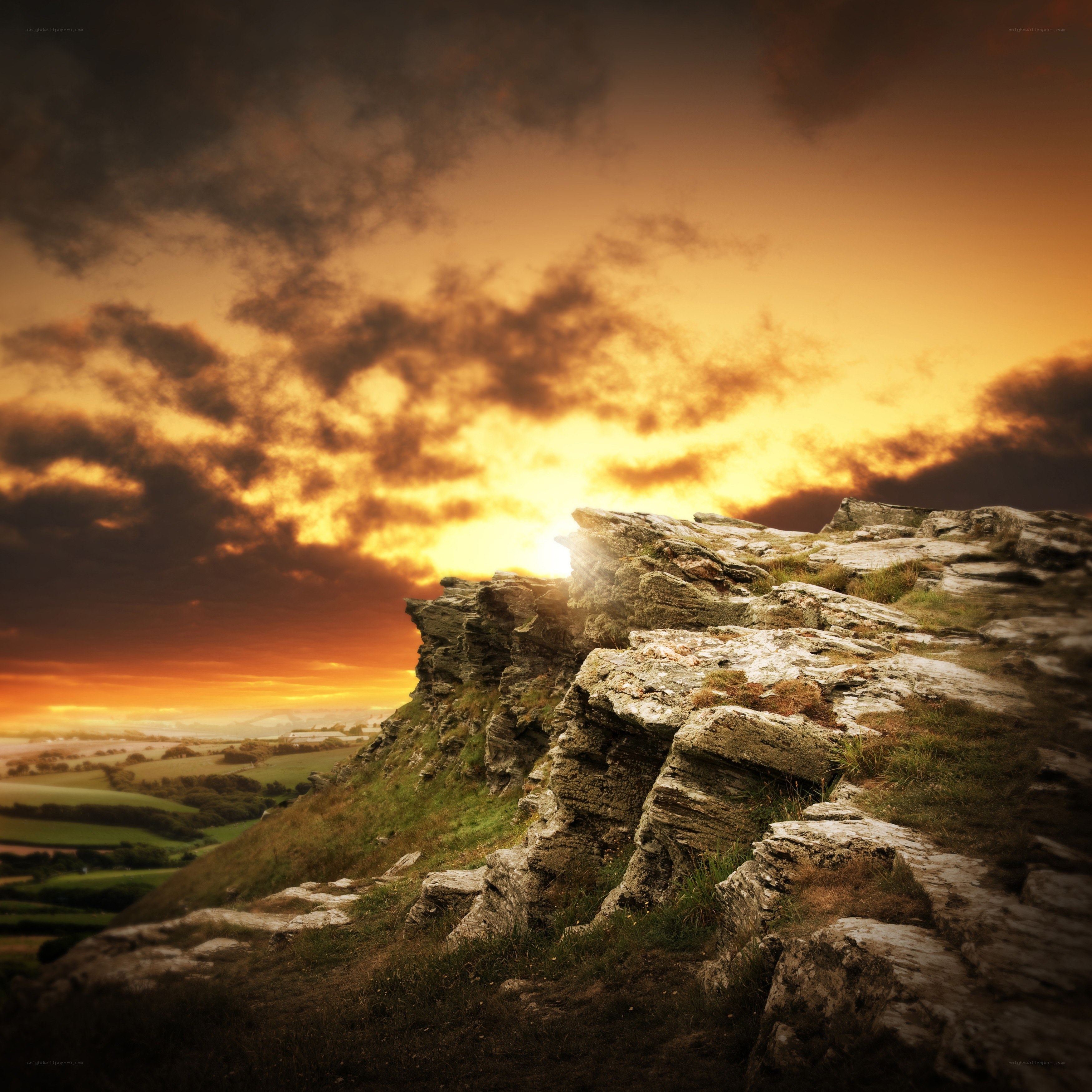 Sunset over rocky cliffs