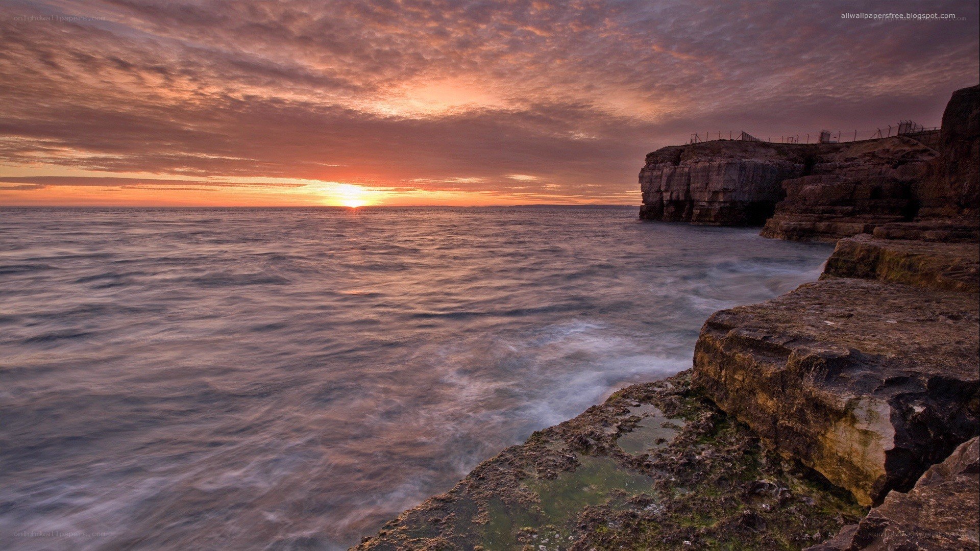 Sunset over rocky cliffs