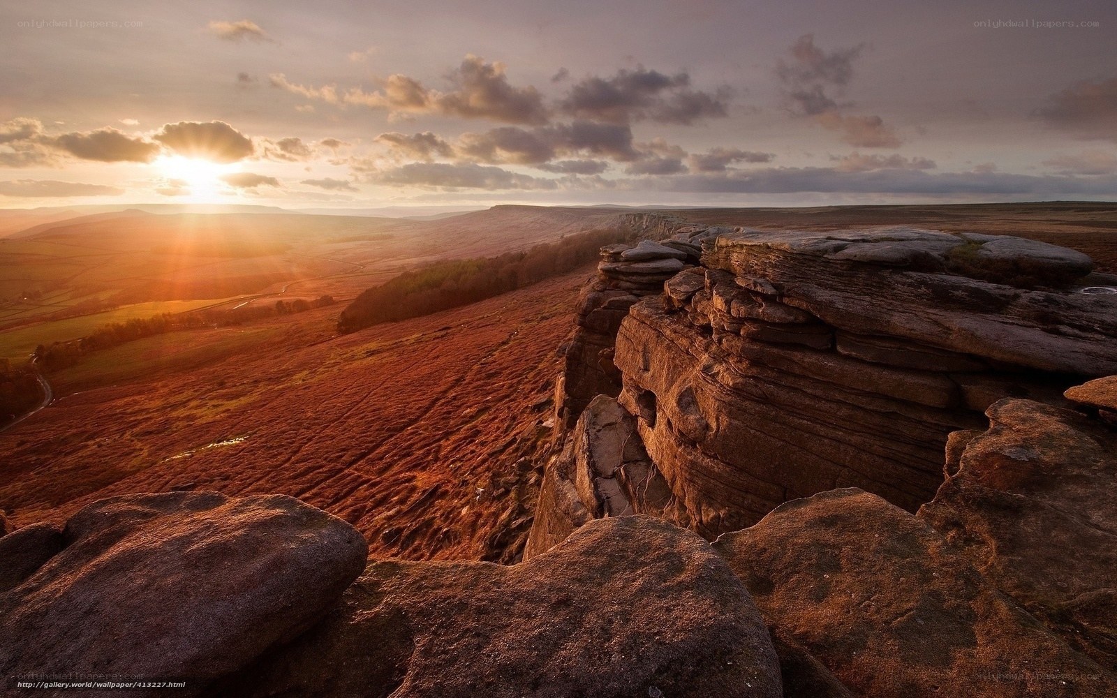 Sunset over rocky cliffs