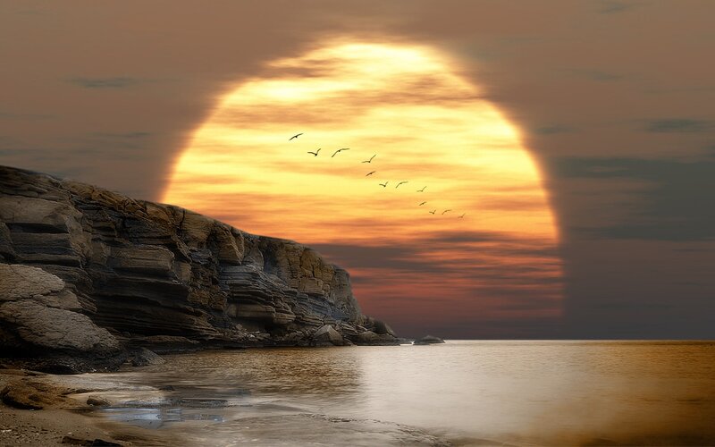 Sunset over rocky coast