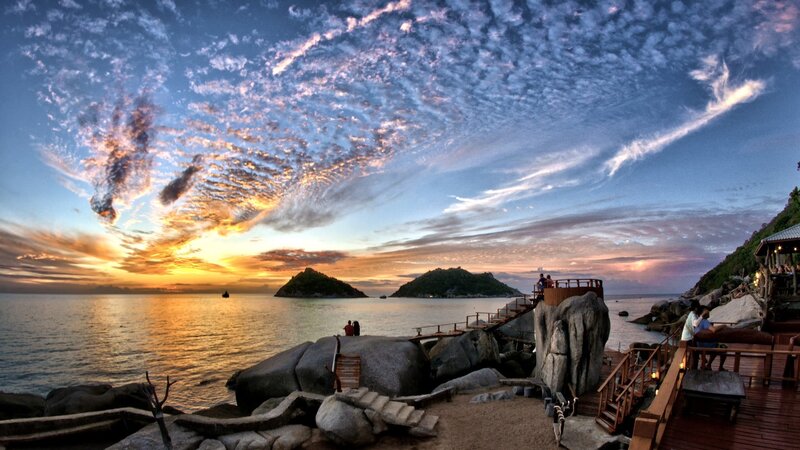 Sunset over Rocky Coast — Blue, Dramatic, Photograph, Islands
