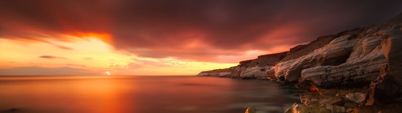 Sunset over Rocky Coast — Orange, Dramatic, Photograph, Ocean, Sky, Rocks