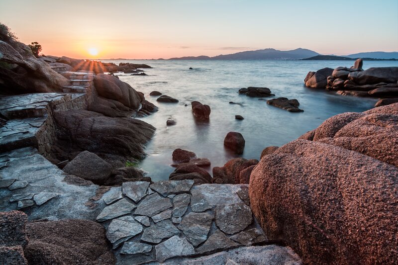 Sunset over Rocky Coast — Orange, Serene, Photograph, Sun
