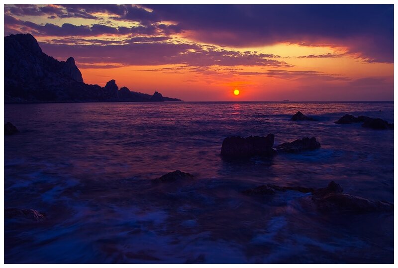 Sunset over Rocky Coast — Purple, Dramatic