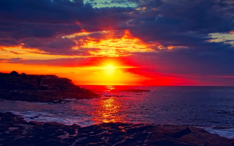 Sunset over Rocky Coast — Red