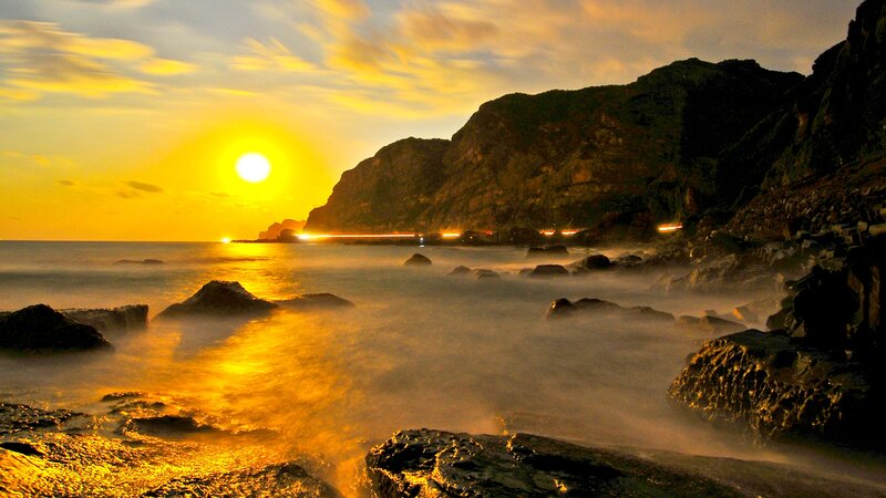 Sunset over Rocky Coast — Yellow, Serene