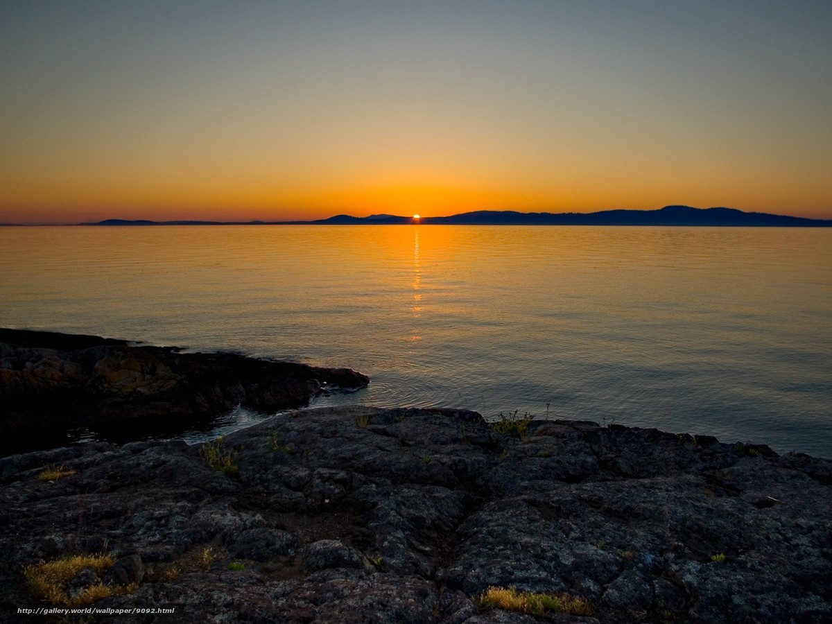 Sunset over rocky coast